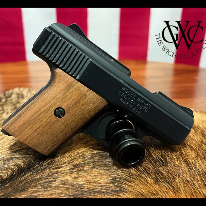 Raven Arms MP-25 Blued w/ Walnut Grips Possibly Unfired Original Box